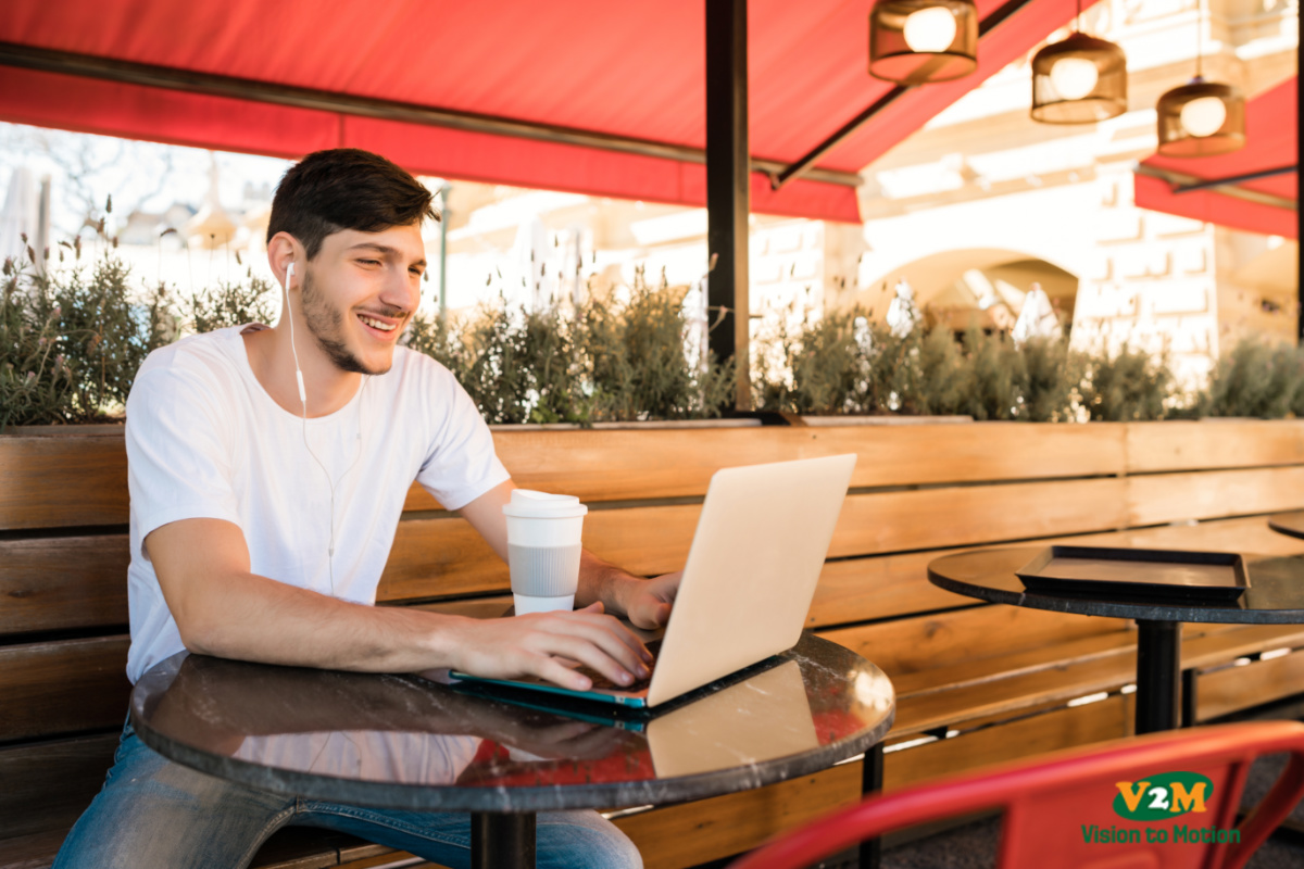 young man using his laptop